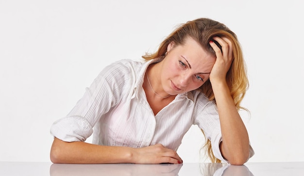 Signs of low HB: Tired business woman experiencing fatigue, paleness, and headache.