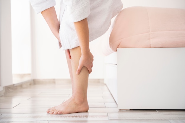 Poor leg circulation symptoms like cold feet, tingling, and leg cramps caused by diabetes, high blood pressure, and plaque buildup. Learn the causes of poor blood flow (and how to Improve it).